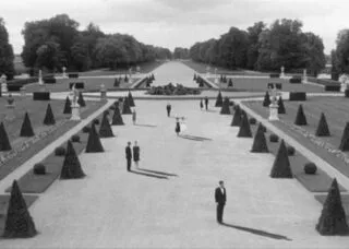 Black and white image of formal garden path from Last Year at Marienbad