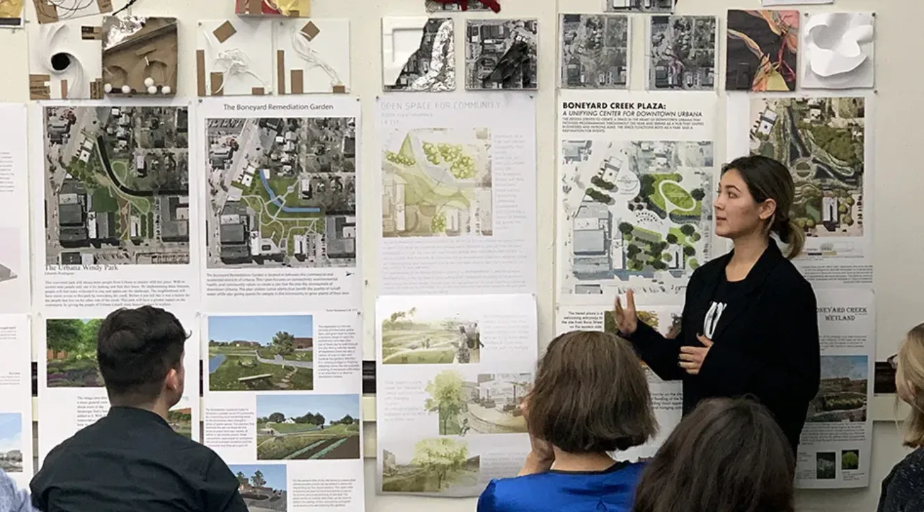 Photo of an MLA student presenting work in the Foundation Design Studio