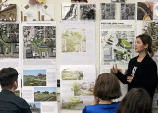 Photo of an MLA student presenting work in the Foundation Design Studio