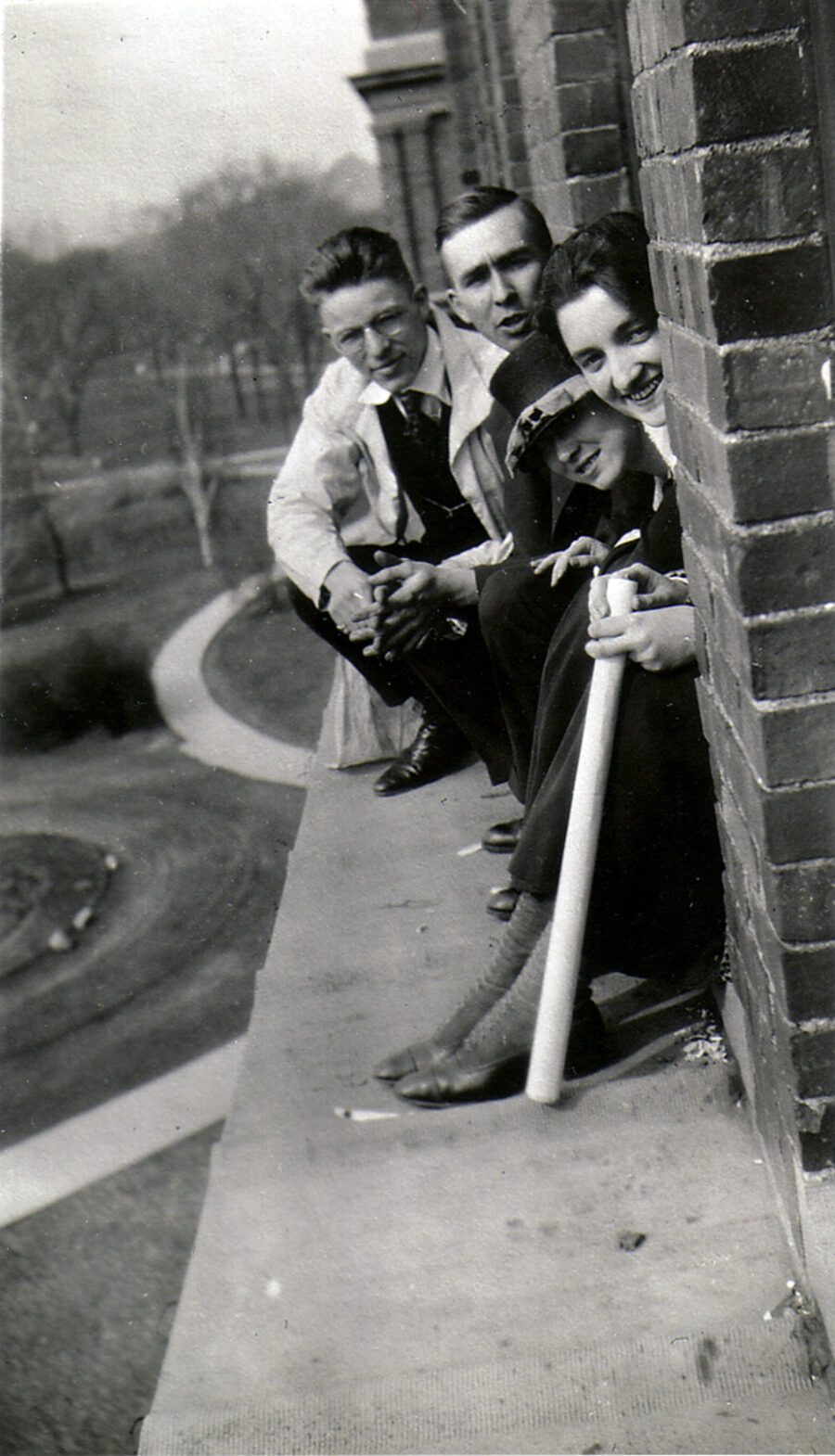 View of Professor Irving L. Peterson and students on the cornice of Davenport Hall