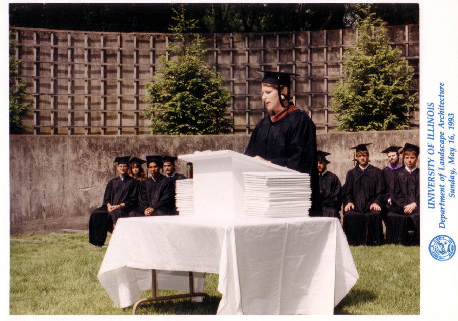 Photo of Debra L. Mitchell (MLA 1975) delivering the Convocation Address (1993)