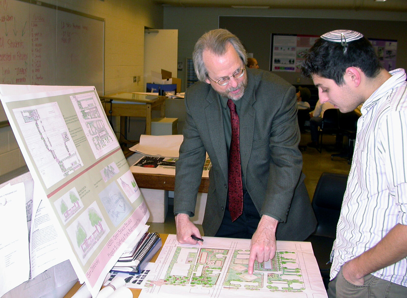 Photo of Jim Wescoat reviewing LA 335 project by Shimon Zimbovsky (BLA 2009, MLA 2013)
