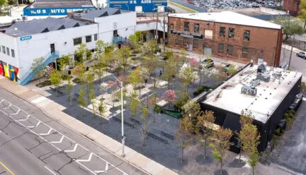 Photo showing transformation of a parking lot in Detroit made possible through depaving