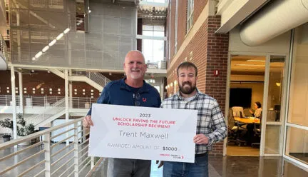 Photo of Trent Maxwell with Unilock representative