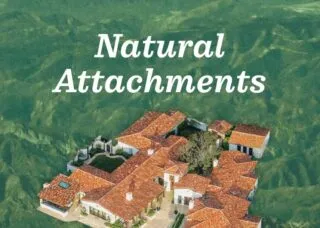 book cover - with many houses within green landscape