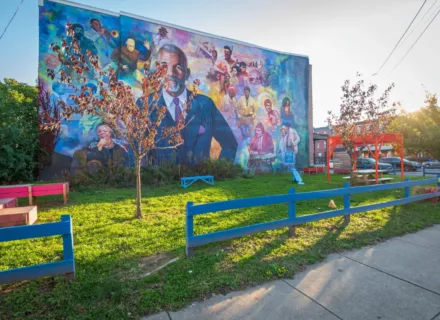 A beautified lot featuring a mural honoring journalist and West Philly native Ed Bradley. Courtesy of Pennsylvania Horticultural Society