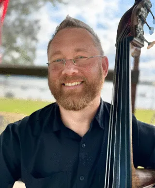 Andrew Anderson with a double bass