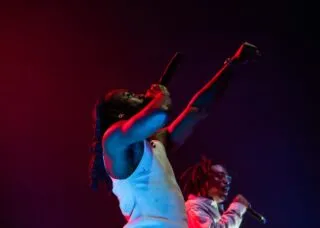 Johnny Venus and Doctur Dot, the duo that make up Earthgang, perform for fans at The Canopy Club on Sept. 20. Photo by Anika Khandavalli, Daily Illini.