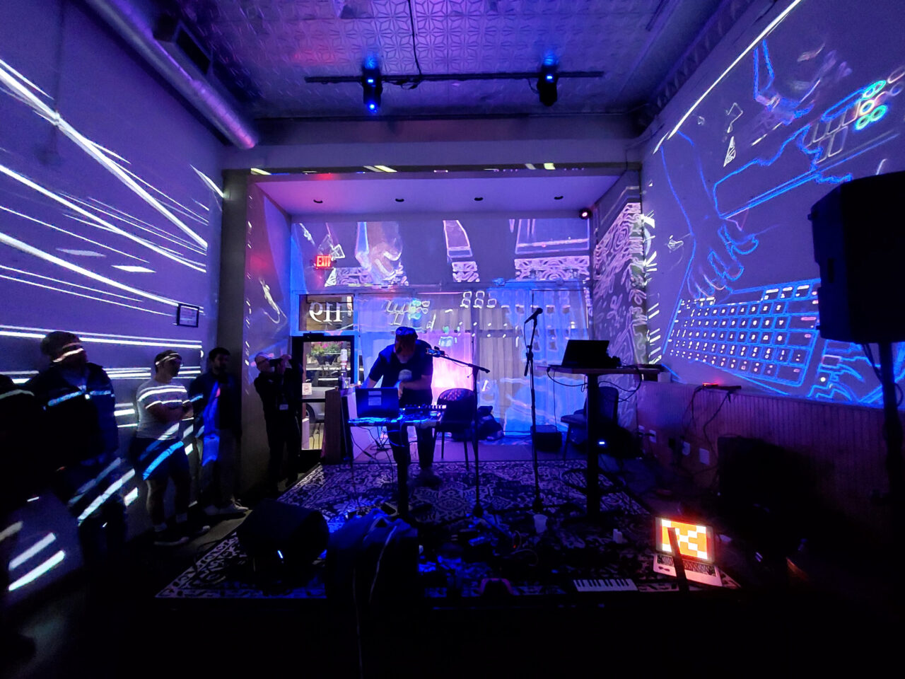 Experimental computer music and visual effects fill the Gallery Art Bar at a PdMaxCon25~ late night session on Sept. 6, 2025 as Mike Moreno performs his DSP Electronic Music Live Set.