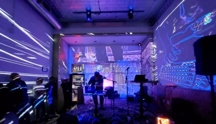 Experimental computer music and visual effects fill the Gallery Art Bar at a PdMaxCon25~ late night session on Sept. 6, 2025 as Mike Moreno performs his DSP Electronic Music Live Set.