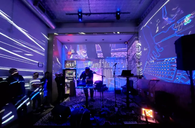 Experimental computer music and visual effects fill the Gallery Art Bar at a PdMaxCon25~ late night session on Sept. 6, 2025 as Mike Moreno performs his DSP Electronic Music Live Set.