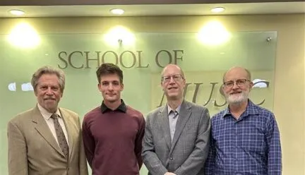 2025 Paul Rolland Competition winner Luke Brann with judges