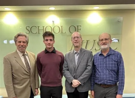 2025 Paul Rolland Competition winner Luke Brann with judges