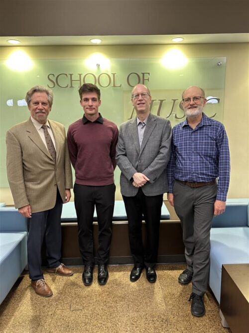 2025 Paul Rolland Competition winner Luke Brann with judges