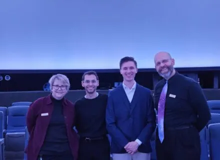 Colin Hochstetler and Hayden Mesnick pose with staff of the Staerkel Planetarium at Parkland College