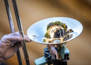 trombone pointed up in the air