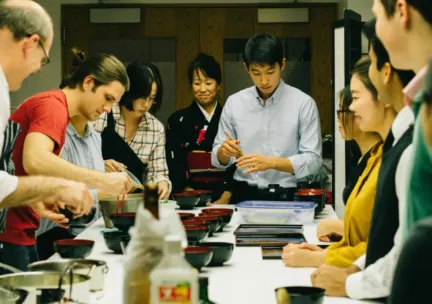 Jennifer Gunji-Ballsrud, director of Japan House, oversees student work.