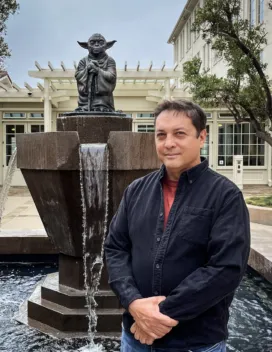 Paul Zinnes in front of Yoda statue fountain at Lucas Arts HQ in San Francisco