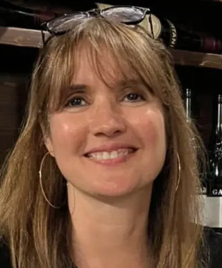 woman with medium brown hair smiling