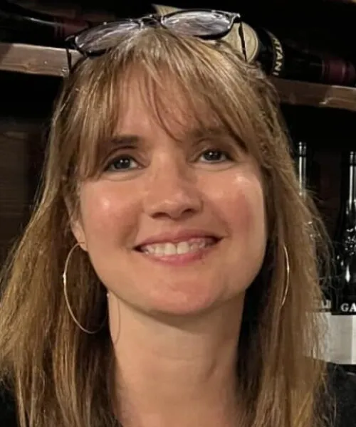 woman with medium brown hair smiling