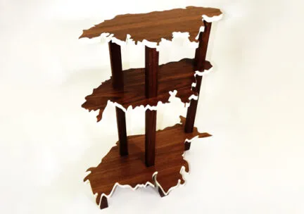 bookshelf with three tiers in the shape of the Sperry Glacier