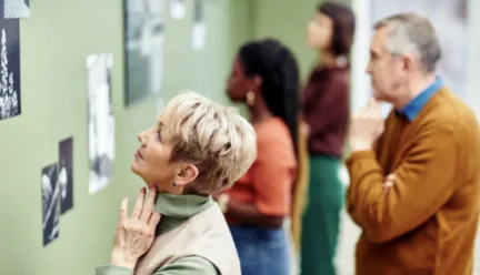 Woman looking at painting