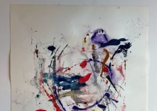 abstract painting with reds, blues, greays, purples, and browns. Looks a little like a heart