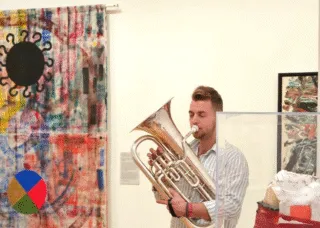 man playing instrument