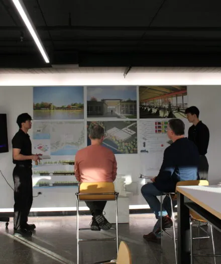 people presenting their posters