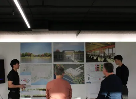 people presenting their posters