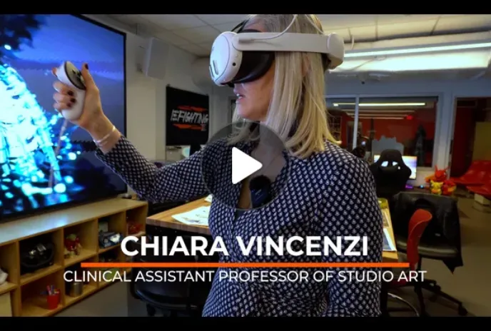 screenshot of video with person wearing VR goggles