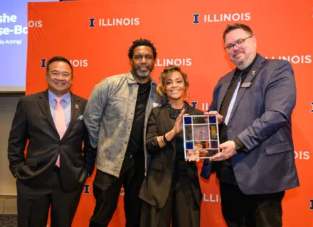 Associate Dean for Advancement Jon Salvani with a Legacy Award recipient, nominator, and the dean at the ceremony.