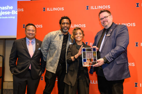 Associate Dean for Advancement Jon Salvani with a Legacy Award recipient, nominator, and the dean at the ceremony.
