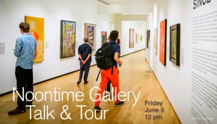 several people walking in a gallery