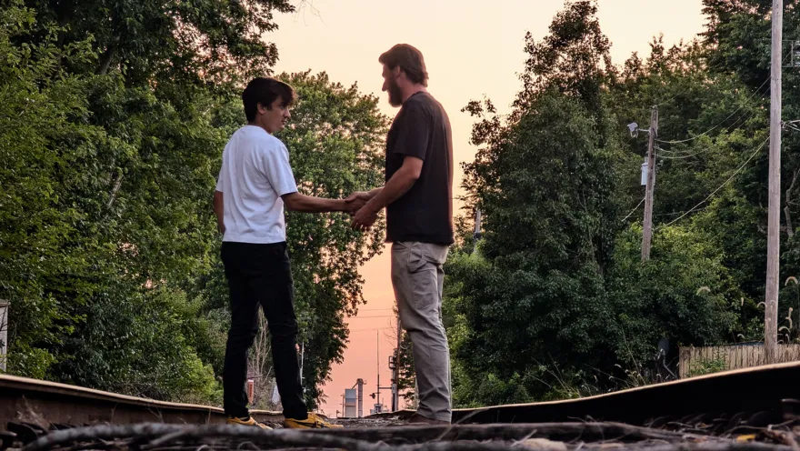 two people holding hands