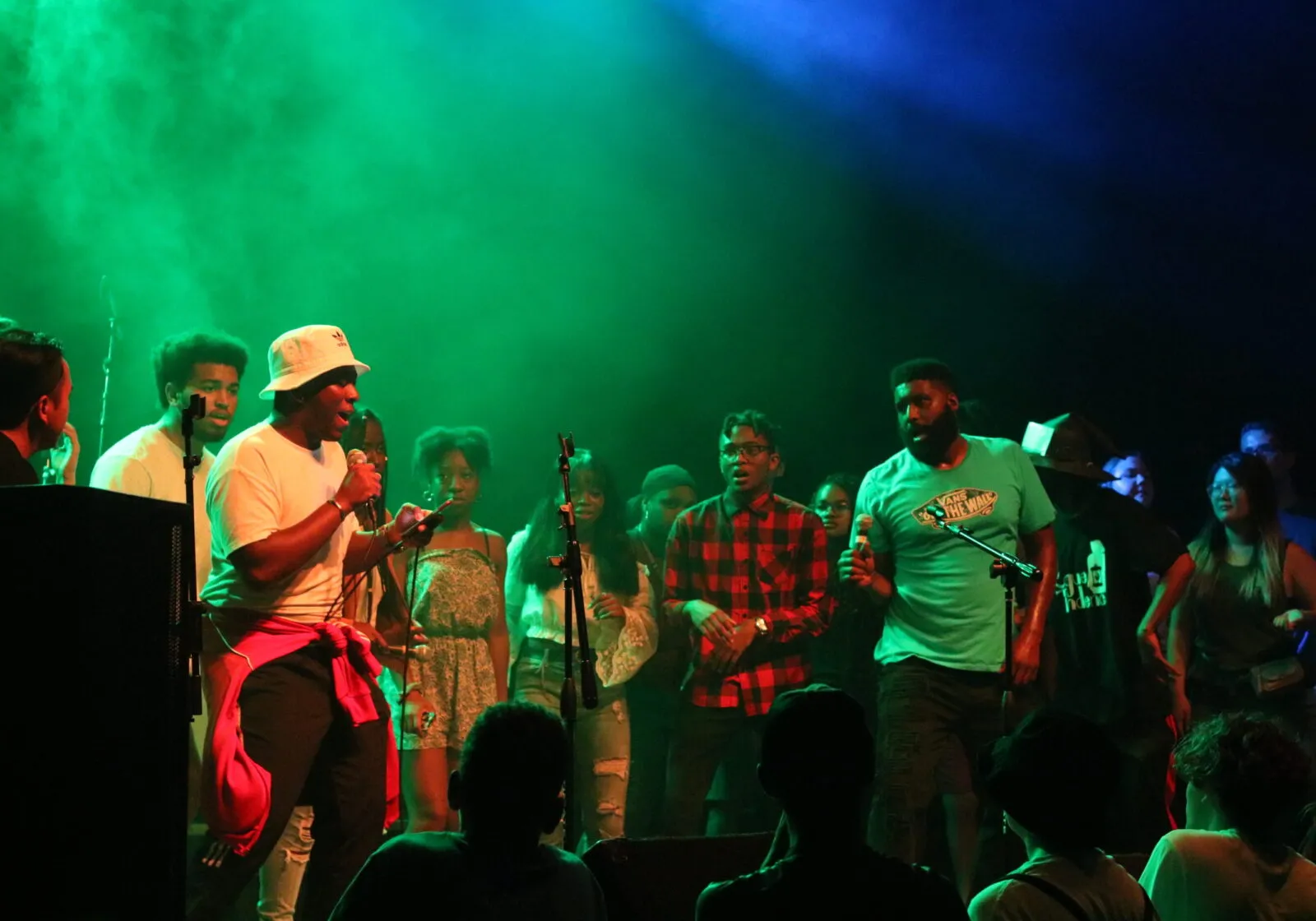 lots of people onstage performing