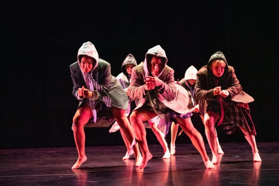 several people dancing onstage