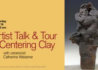 woman looking at art in museum