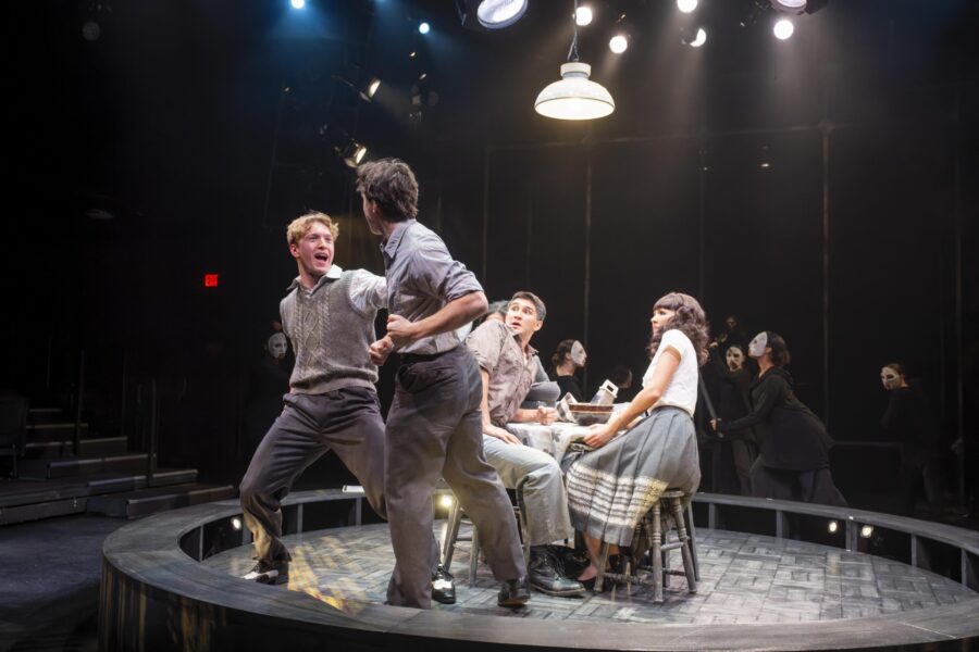 people fighting onstage