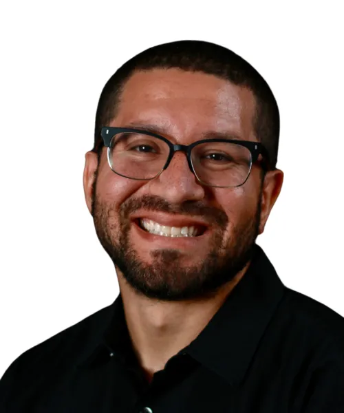 person wearing glasses smiling