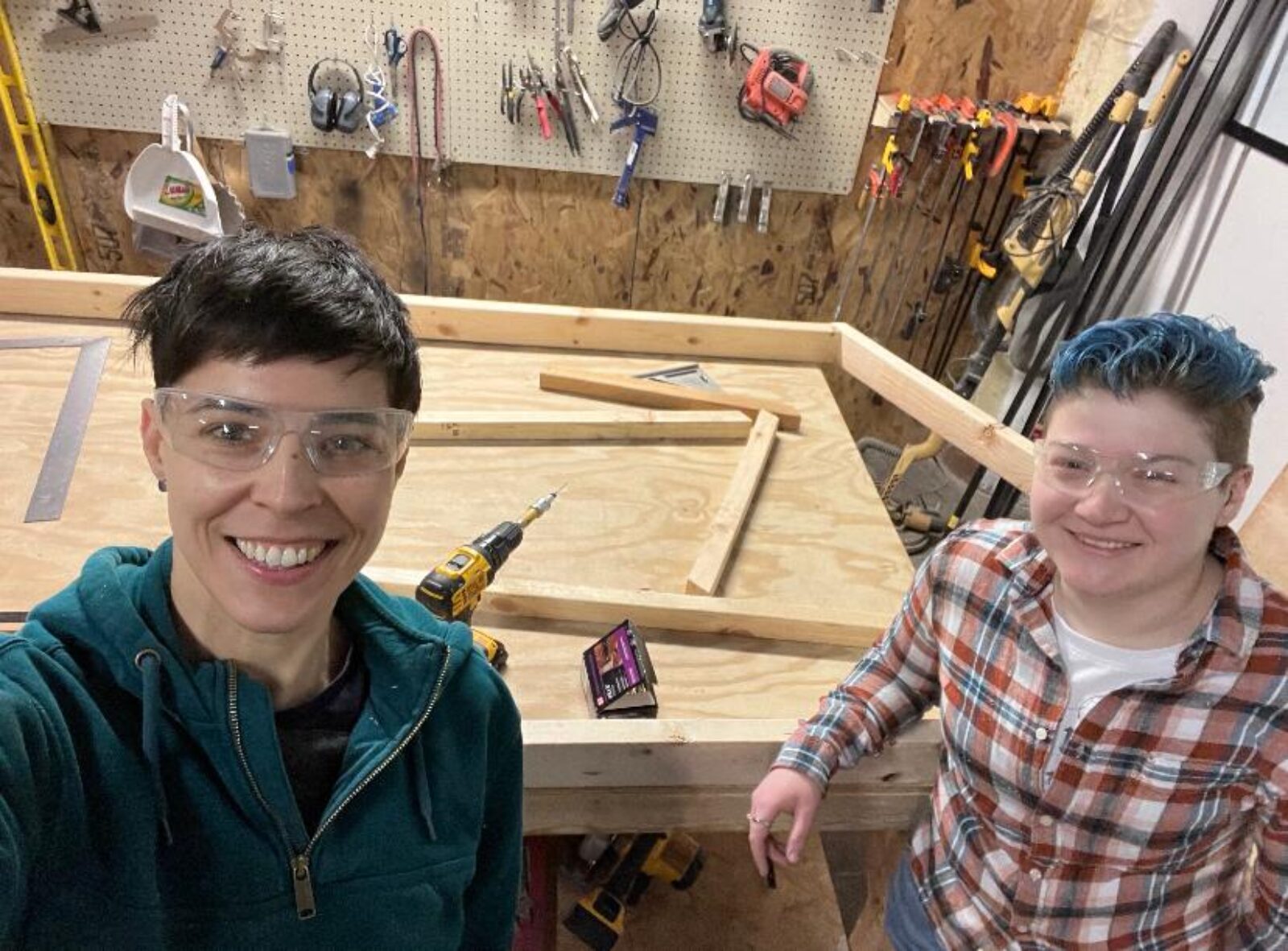 2 people in a build shop