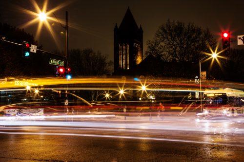 Busy night street scene on campus