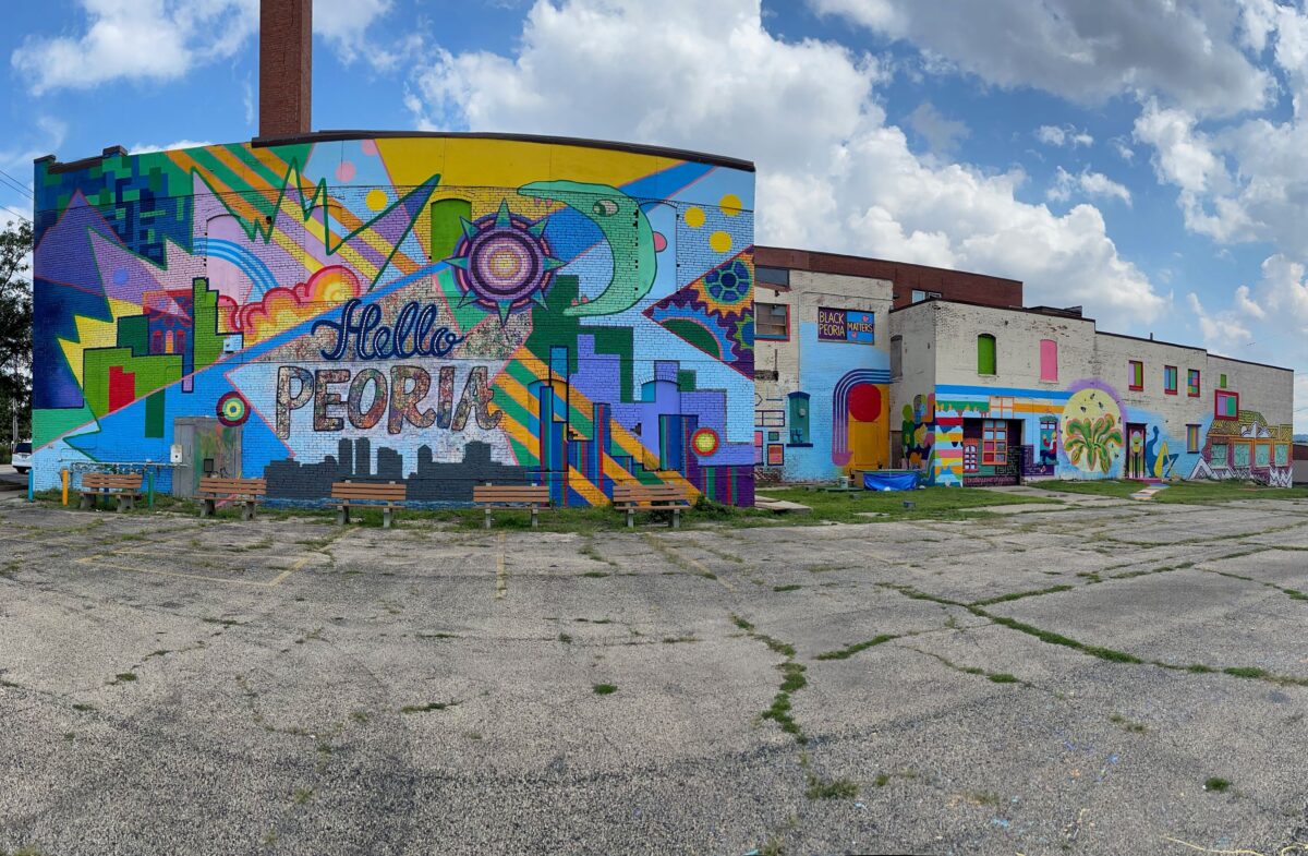 street with buildings with painted murals