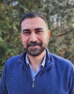 Photo of Aiman Soliman outside in front of trees
