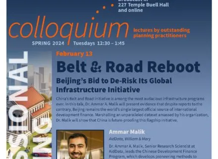 Blue poster with orange and white lettering describing speaker and talk