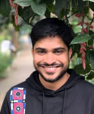 Photo of Pranav Kuttaiah outside under a tree