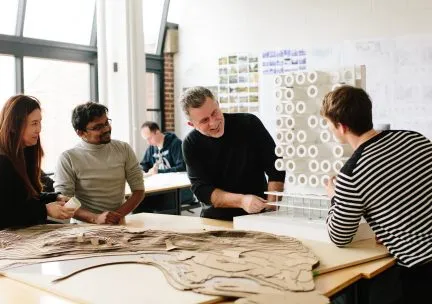 Students and faculty in studio 