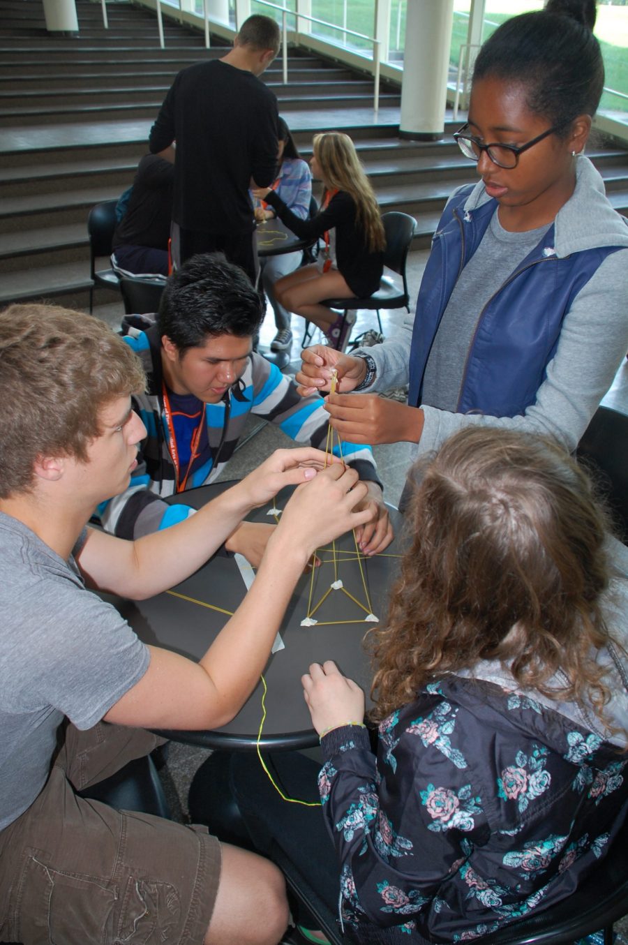 students working together in the atrium 