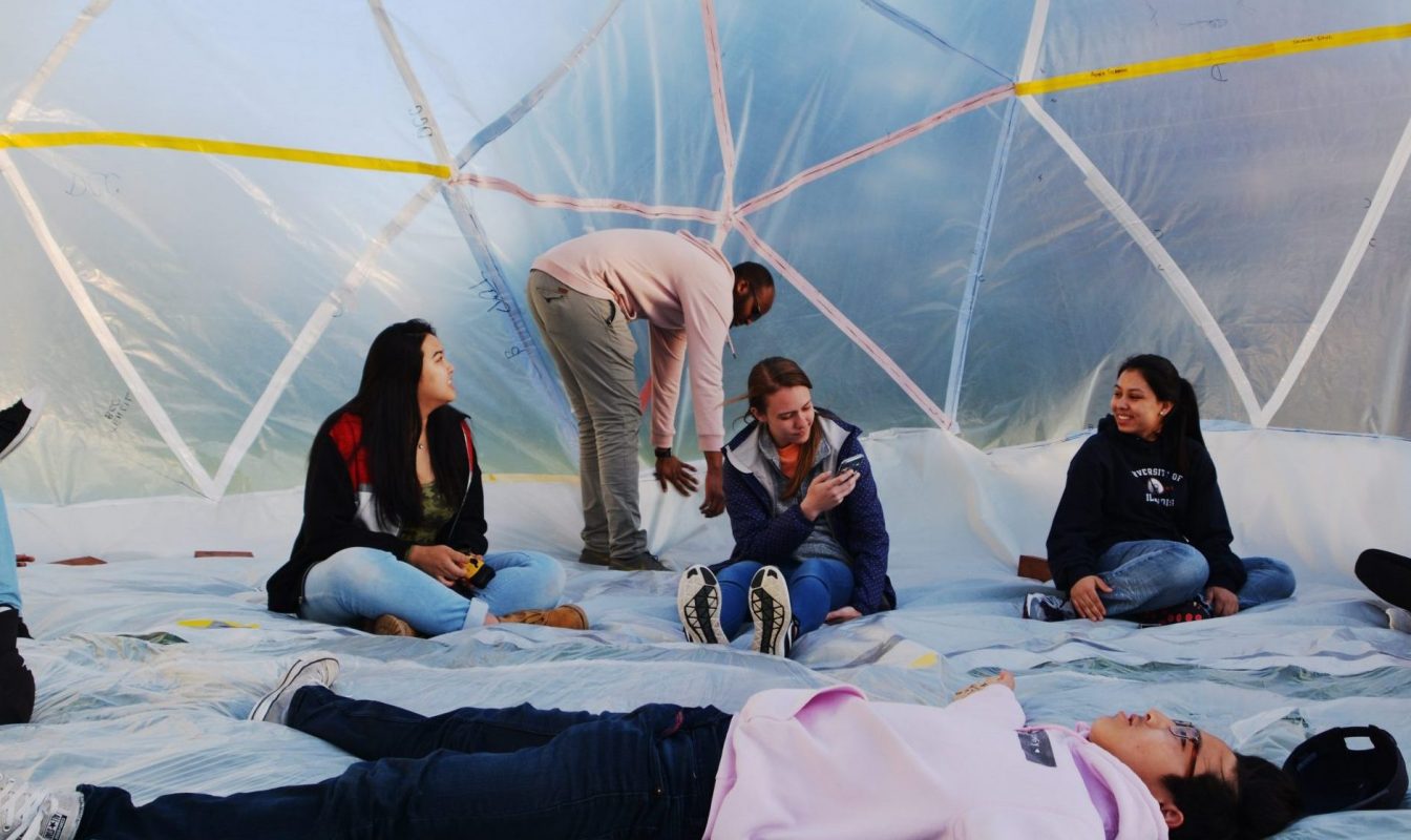 students inside an inflatable dome
