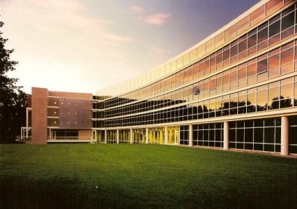 photo of temple buell hall's west glass facade at sunset 